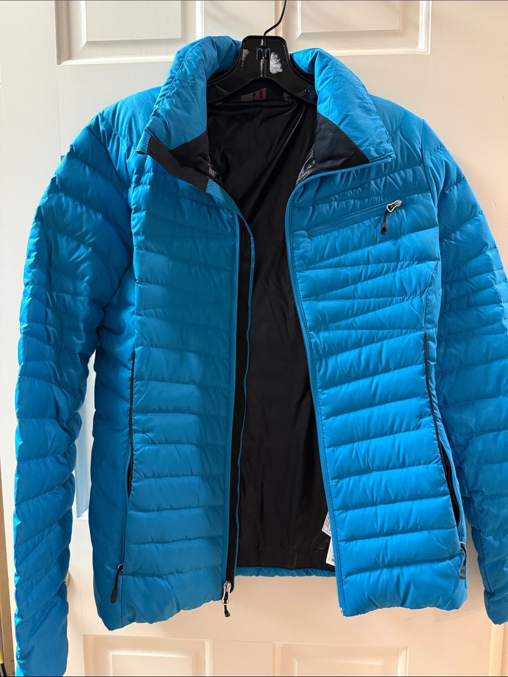 Spyder Women's Lightweight Puffer Jacket in Bright Blue
